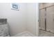 Bathroom with shower and white marbled floors, granite counters at 3085 Tom Sawyer Dr, Kissimmee, FL 34746
