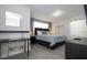 Spacious bedroom featuring a large bed with stylish decor, providing a relaxing retreat at 3085 Tom Sawyer Dr, Kissimmee, FL 34746