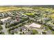 Stunning aerial shot of the community, highlighting the nearby clubhouse and well-kept grounds at 3281 Saloman Ln, Clermont, FL 34711