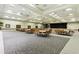 Expansive ballroom with neutral carpet, recessed lighting, and multiple tables with chairs at 3281 Saloman Ln, Clermont, FL 34711