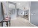 Open foyer with tiled floors, decorative niche, and a view into the adjacent living area at 3281 Saloman Ln, Clermont, FL 34711