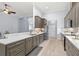 Bright kitchen features stainless steel appliances, light countertops, and wood look floors at 3281 Saloman Ln, Clermont, FL 34711