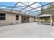 A large screened patio, ideal for outdoor living and entertaining in a private setting at 3281 Saloman Ln, Clermont, FL 34711
