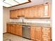 Stylish kitchen with granite countertops, stainless steel appliances, and custom cabinetry for a modern look at 353 Wekiva Cove Rd, Longwood, FL 32779