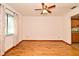 Cozy room with hardwood flooring and lots of natural light next to the kitchen is move in ready for your Gathering at 353 Wekiva Cove Rd, Longwood, FL 32779