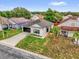 This cozy home offers a well-manicured lawn, a two-car garage, and mature landscaping at 3622 Huntwicke Blvd, Davenport, FL 33837