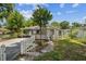 Charming home with a white picket fence, carport, and stone walkway at 3823 Avenue R Nw, Winter Haven, FL 33881
