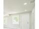 Sunlit living room with large windows at 3823 Avenue R Nw, Winter Haven, FL 33881