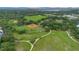 Aerial view of a neighborhood park with multiple baseball fields and lush greenery at 4065 Anissa Ave, Orlando, FL 32814