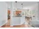 Well-equipped kitchen and dining area with stainless steel appliances, a breakfast bar, and tile floors at 4065 Anissa Ave, Orlando, FL 32814