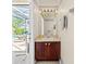 Charming bathroom with vanity, sink, mirror, and ducky themed decor at 407 Grand Reserve Dr, Davenport, FL 33837