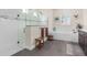 Bright bathroom features a large tiled shower and soaking tub with modern fixtures at 418 Gleaming Andover Way, Longwood, FL 32779