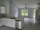 Stylish kitchen with a breakfast bar, stainless steel appliances, and open layout at 4333 Sw 157Th Ter, Ocala, FL 34481