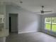 Bright and airy living room with sleek floors, ceiling fan, and modern finishes at 4333 Sw 157Th Ter, Ocala, FL 34481