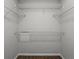 The closet has white metal racks and wood flooring at 4519 Willamette Cir, Orlando, FL 32826