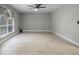Spacious room features tile flooring, large window, and ceiling fan at 4519 Willamette Cir, Orlando, FL 32826