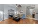 Cozy living room with hardwood floors, offering a welcoming and relaxing space at 5063 Carillon Ln, Windermere, FL 34786