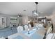 Spacious open-concept living space, seamlessly connecting dining, kitchen, and living areas at 5063 Carillon Ln, Windermere, FL 34786