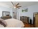Spacious main bedroom featuring hardwood floors and ensuite bathroom access at 5063 Carillon Ln, Windermere, FL 34786
