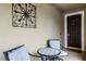 Inviting front porch with stylish seating area, perfect for relaxing outdoors at 5063 Carillon Ln, Windermere, FL 34786