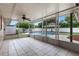 The enclosed patio offers views of the pool and gazebo, providing a tranquil outdoor space for relaxation at 5089 Jennifer Pl, Orlando, FL 32807