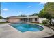 Beautiful backyard pool area with a sparkling pool, well-maintained patio, and lush landscaping for ultimate relaxation at 5089 Jennifer Pl, Orlando, FL 32807