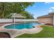 Enjoy the refreshing pool with gazebo in a backyard, creating a peaceful setting with lush green surroundings at 5089 Jennifer Pl, Orlando, FL 32807