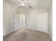 Bedroom featuring carpet, a ceiling fan, and closet space at 5231 Alavista Dr, Orlando, FL 32837