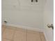 Tiled laundry room with white walls and washer/dryer hookups at 5231 Alavista Dr, Orlando, FL 32837