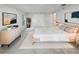 Well-lit main bedroom featuring neutral tones, a large closet, and stylish contemporary decor at 5231 Alavista Dr, Orlando, FL 32837
