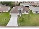 This home features a well-maintained lawn and convenient attached two-car garage at 5517 W Sacramento Ct, Orlando, FL 32821