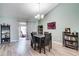 Cozy dining area with a view to the lanai, and stylish decor at 5517 W Sacramento Ct, Orlando, FL 32821