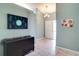 Inviting foyer featuring neutral paint, tile flooring, and decorative accents at 5517 W Sacramento Ct, Orlando, FL 32821