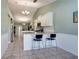 Spacious kitchen with a breakfast bar offering lots of room and natural light at 5517 W Sacramento Ct, Orlando, FL 32821