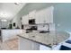 Bright kitchen with stainless steel appliances, granite countertops and plenty of cabinet space at 5517 W Sacramento Ct, Orlando, FL 32821