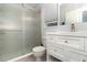 Bathroom featuring a glass-enclosed shower, a white vanity with a sink, and tile flooring at 7058 Archwood Dr, Orlando, FL 32819