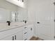 Bathroom featuring sleek countertops, and modern fixtures at 706 Marion Oaks Manor, Ocala, FL 34473