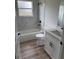 Cozy bathroom featuring a shower and tub combination with modern fixtures and marbled tiles at 706 Marion Oaks Manor, Ocala, FL 34473