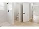 Modern bathroom featuring a walk-in shower with white marble tile and a separate water closet at 706 Marion Oaks Manor, Ocala, FL 34473
