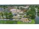 Beautiful town center on the lake showcasing nearby park area with beautiful landscaping and seating at 720 Celebration Ave # 245, Kissimmee, FL 34747