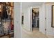 Organized walk-in closet featuring ample storage and shelving for clothing and accessories at 720 Celebration Ave # 245, Kissimmee, FL 34747