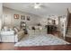 Cozy living room featuring hardwood floors, neutral paint, and staircase access to the upper floor at 720 Celebration Ave # 245, Kissimmee, FL 34747