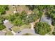 Birds eye view of the home's roof and large backyard at 881 Cedar Cir, Tavares, FL 32778