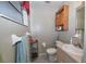 Compact bathroom featuring a built-in vanity with sink and cabinet, offering ample storage at 881 Cedar Cir, Tavares, FL 32778