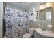 Cozy bathroom featuring an Eiffel Tower shower curtain and vanity with sink and cabinet storage at 881 Cedar Cir, Tavares, FL 32778