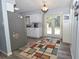Bright kitchen with stainless steel refrigerator and backyard access at 881 Cedar Cir, Tavares, FL 32778