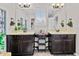 Bathroom features double vanities, lots of decor, neutral colors, and overhead lighting at 888 Wakulla Ln, Winter Springs, FL 32708