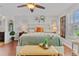 Beautifully decorated bedroom features bright windows, lamps, and wooden accents at 888 Wakulla Ln, Winter Springs, FL 32708