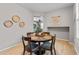Cozy dining area featuring a round table with seating for four, offering a warm and inviting atmosphere at 888 Wakulla Ln, Winter Springs, FL 32708