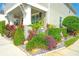 Beautifully landscaped front yard, adding to the curb appeal of this charming home at 888 Wakulla Ln, Winter Springs, FL 32708